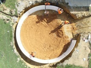 An aerial view of a swimming pool construction project.