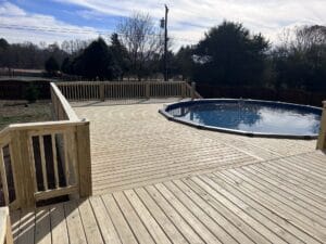 Project: A wooden deck with an inground pool.