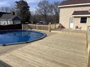 New pool deck and round pool installed by Lexren